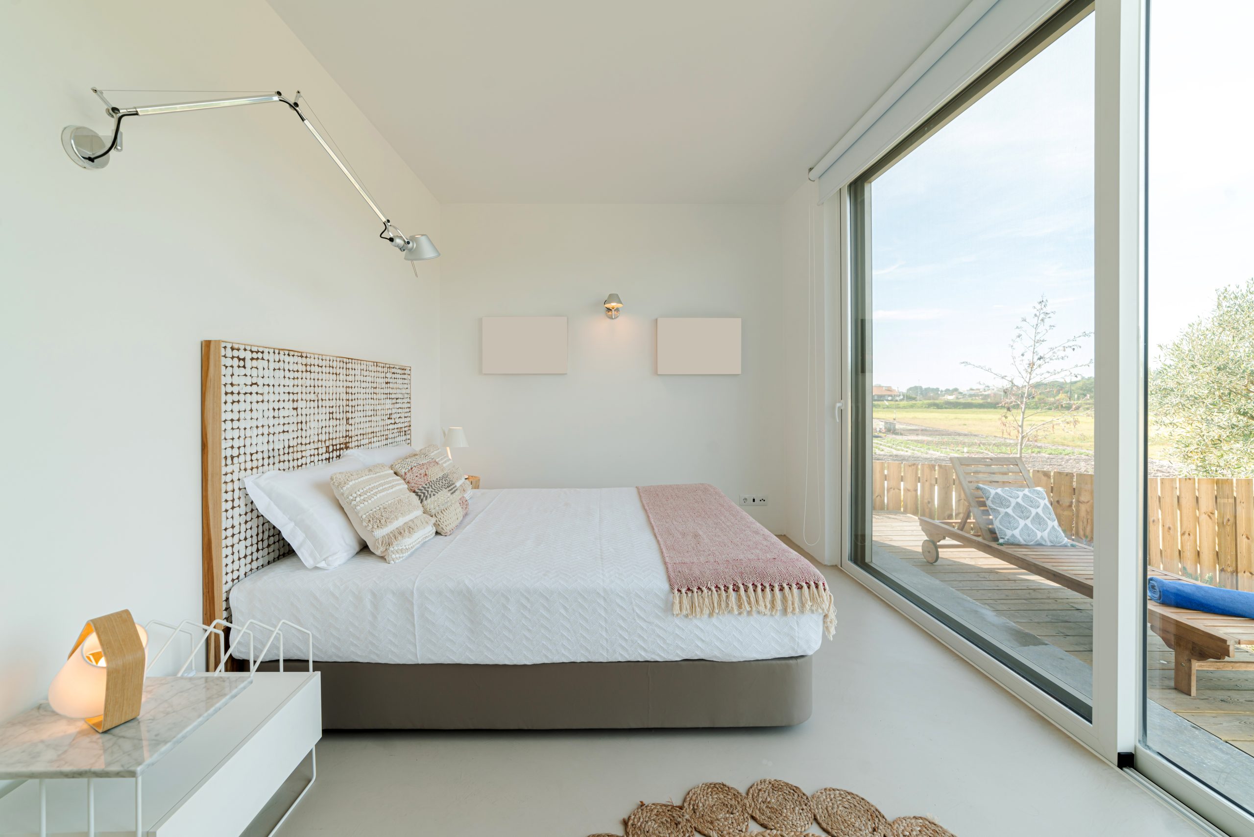 Bedroom suite with king size bed in modern villa